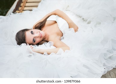 Bride With Long Hair Lying Down