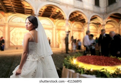 bride in a luxury and crowded courtyard