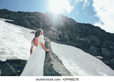 https://image.shutterstock.com/image-photo/bride-mountains-wedding-260nw-439988278.jpg