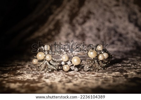 Bride pearl diadem on velvet fabric background