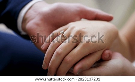 Bride placing the wedding ring on her groom during their wedding ceremony. closeup of bride and groom exchanging wedlock rings groom and bride 4K HD