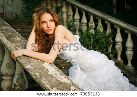Similar – Image, Stock Photo beautiful redhead bride in white dress with a mirror in the green forest