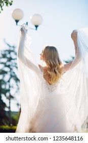 bride posing in the park