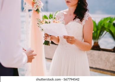 Bride Reading Wedding Vows. Wedding Ceremony
