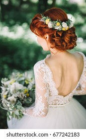 Bride With Red Hair And Wreath From Flowers