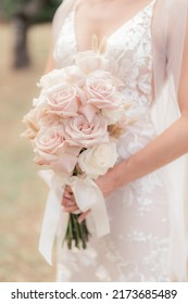 Bride And Rose Bouquet A Moment Before The Ceremony