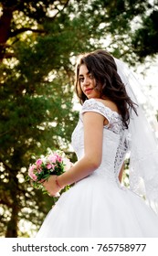 bride under the tree view from below	