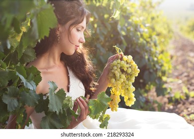 Bride in a vineyard, autumn