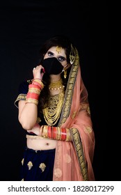 Bride Wearing White Indian Traditional Cloth With Face Mask During Wedding Celebration In India