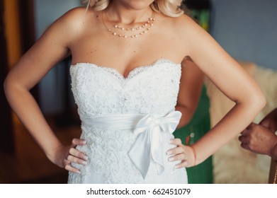 Bride wears a wedding dress