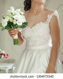 Bride with white  bouquet (eustoma) 