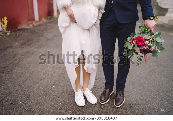 bride with sport shoes