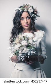 Bride With Winter Inspired Bouquet And Flower Crown