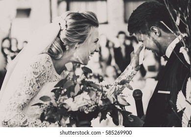 Bride Wipes Groom's Tears While They Stand Before Wedding Altar