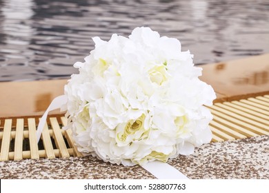 Bride's bouquet at pool side