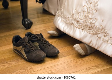 Bride's Feet With Tennis Shoes