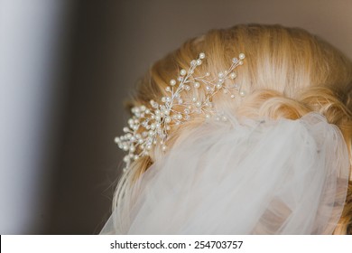 Bride's Hair, Styled With A Hair Ornament. Wedding Accessories