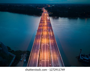 A Bridge Across Kelantan River, Illuminated At Night.