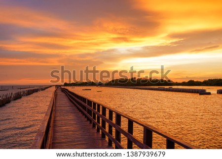 bridge alonng the sea and beautiful sunset