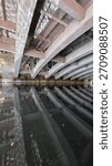 Bridge Beams Reflected in the River From an Underside View Taken From a Boat