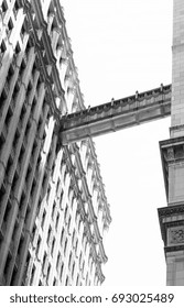 A bridge between two large city buildings