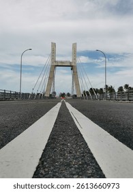A bridge is a building structure designed to connect two points separated by obstacles, such as rivers, valleys, highways, or railroads. Its main function is to facilitate the movement of people, vehi