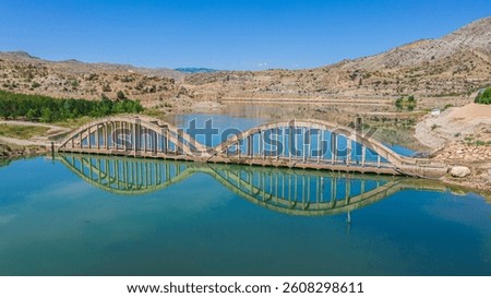 Bridge Built Over the Dam and Its Reflection on Water Susehri Sivas Turkey.