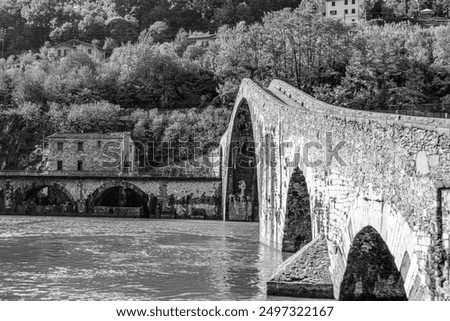 Bridge of the Devil or Ponte della Maddalena historic landmark in Garfagnana. Serchio river. Borgo a Mozzano, Lucca. Tuscany, Italy