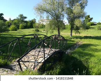 
bridge forged in a recreation park - Shutterstock ID 1418151848