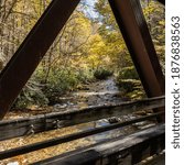 Bridge Frames Fall Colors Along Little River in Great Smoky Mountains National Park