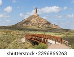 The bridge leading to Chimney Rock, a geological rock formation in the North Platte River valley