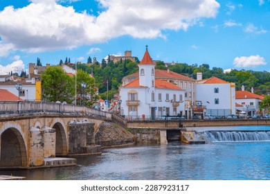 Bridge leading to the old town Tomar in Portugal. - Powered by Shutterstock