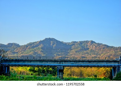 A Bridge With Mountains Background In Wonogiri, Indonesia