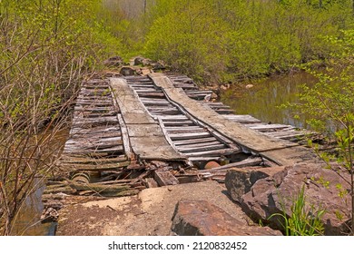 Bridge in Need of Repair Over the Blackwater River in the Canaan Valley National Wildlife Refuge - Shutterstock ID 2120832452