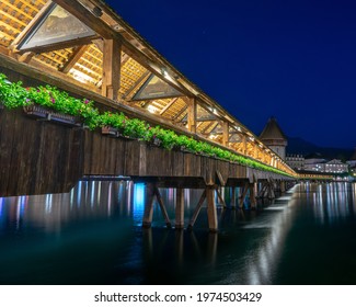 The Kapellbrücke Bridge At Night In Lucerne, Switzerland