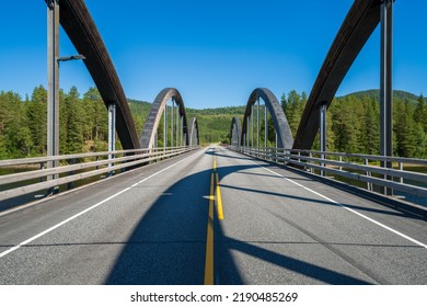 Bridge (Nybergsunds bro) over Klarälven river in Nybergsund, Norway. - Shutterstock ID 2190485269