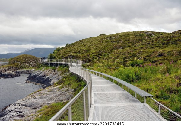 Bridge on one of the stop in the\
middle of the Atlantic ocean road, car stops along the road are\
availabele on many places, beautiful nature,\
summertime