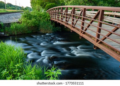 Bridge Over Creek At Portage Creek Bicentennial Park In Michigan