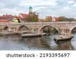 Bridge over Danube in Regensburg Germany . Medieval Arch bridge over the river . Steinerne Brucke