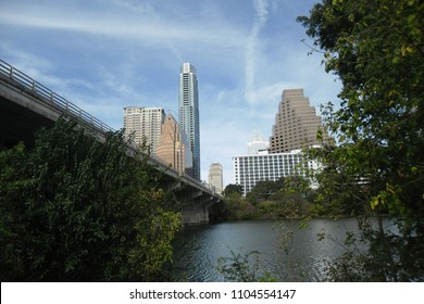 Bridge Over Ladybird Lake With Austin Skyline