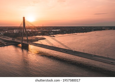 Bridge over river at sunset - Shutterstock ID 1957580017