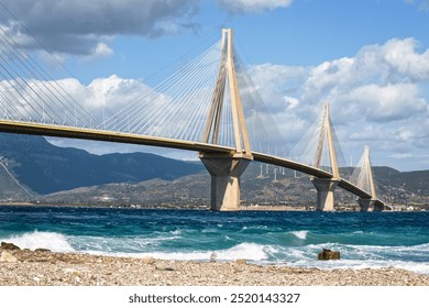 Rio–Antirrio Bridge over the sea in Greece.Rio–Antirrio Bridge is the world's longest multi-span cable-stayed bridge connecting mainland Greece to Peleponnese - Powered by Shutterstock