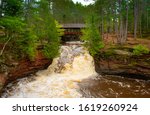 Bridge over the waterfall at the Amnicon Falls State park in Northern Wisconsin