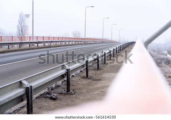 Bridge for pedestrians\
and cars in winter