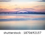 Bridge with reflection on Columbia river at sunset, Kennewick Washington