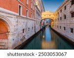 Bridge of Sighs in Venice, Italy at twilight over the Rio di Palazzo.