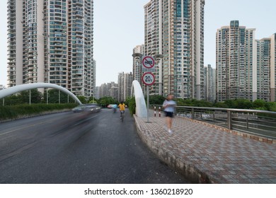 A Bridge And Some Modern Buildings In Putuo District Over The Wusong River. Residential Skyscrapers  In Shanghai, China