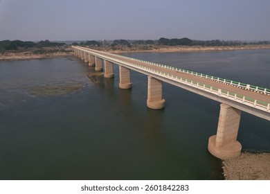 A bridge is a structure designed to span a gap or obstacle, enabling passage over it, such as a river, valley, or road, facilitating transportation and connectivity. 