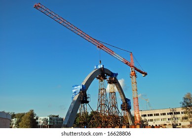 bridge under construction with crane