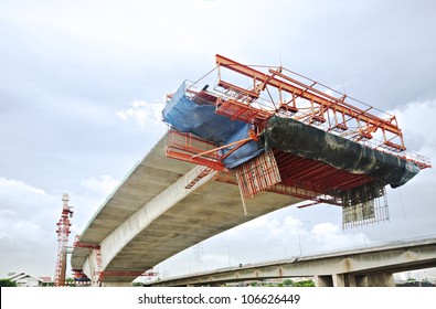 Bridge under construction in over the Chao Phraya River in Bangkok, Thailand, viewed from below.